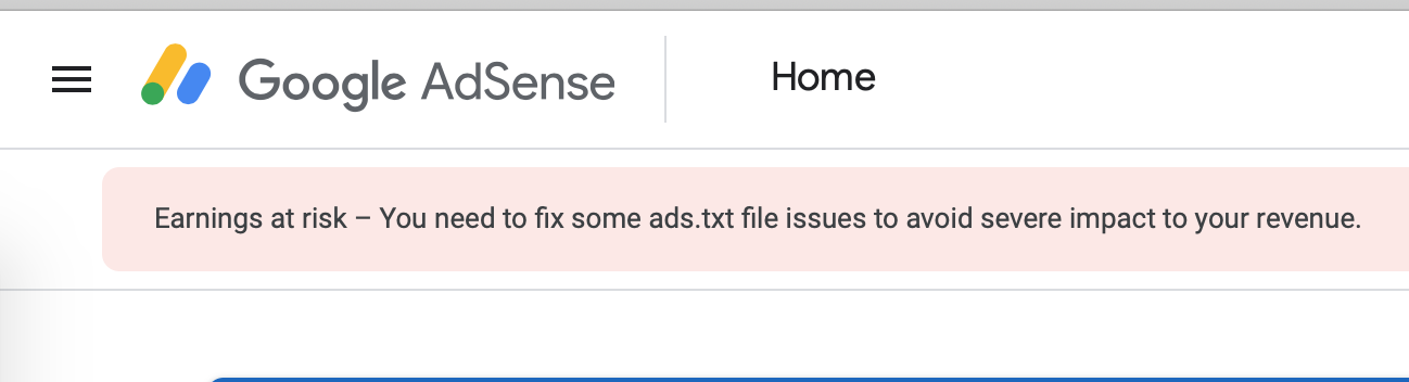 The 'Earnings at risk – You need to fix some ads.txt file issues to avoid severe impact to your revenue.' warning shown in the Google AdSense console when ads.txt issues are found, as of July 2019.
